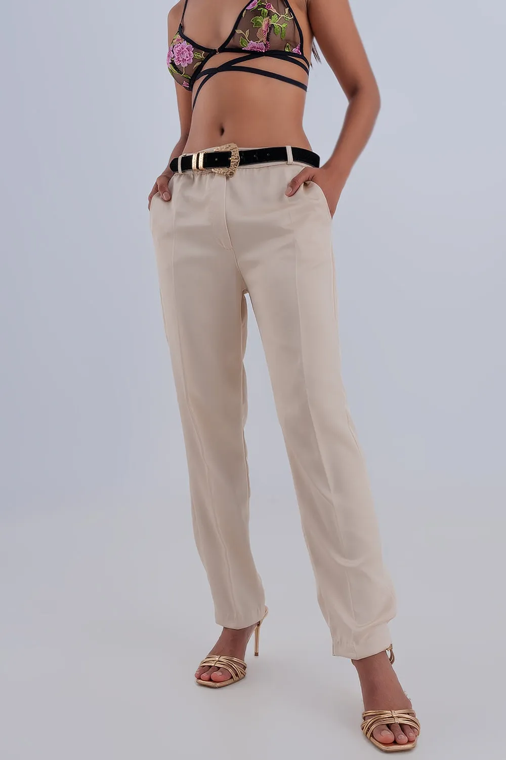 Pantaloni a fondo ampio in raso color beige